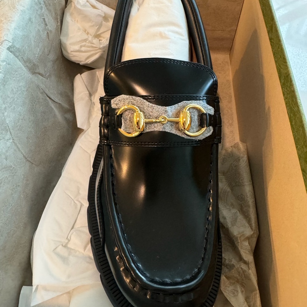 Black GUCCI Loafers with Gold Buckle